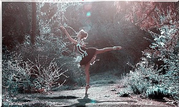 Girl dancing in forest