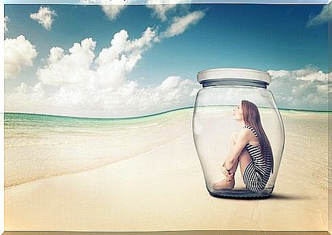 Person in glass jar