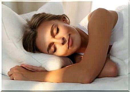 A woman who rests after learning about the environmental impact of a good night's sleep