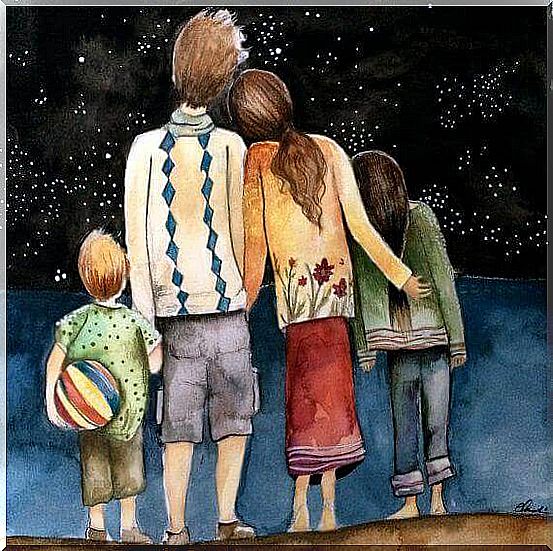 Family under a starry sky