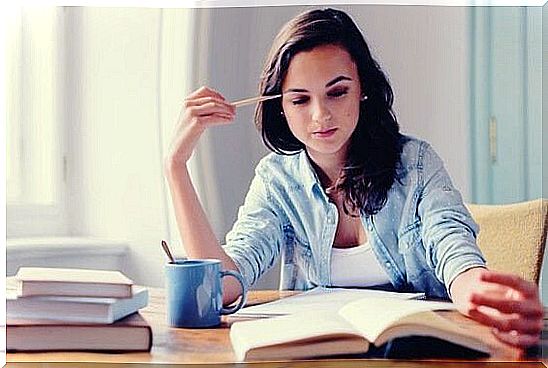 Woman reading book.