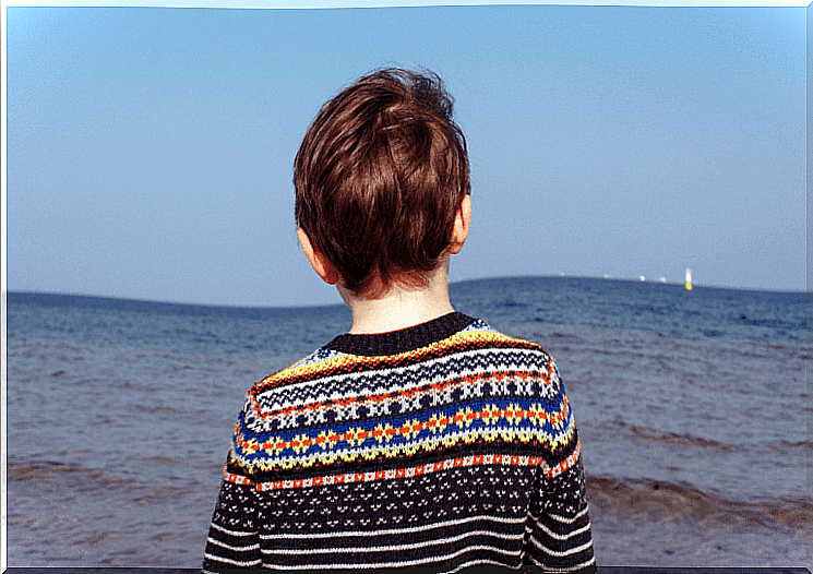 Boy by the sea