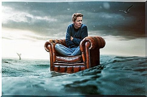 Man out at sea in armchair