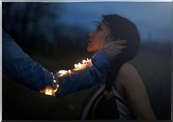 Woman and burning hand