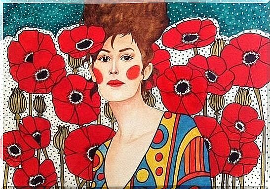 Woman among red flowers.