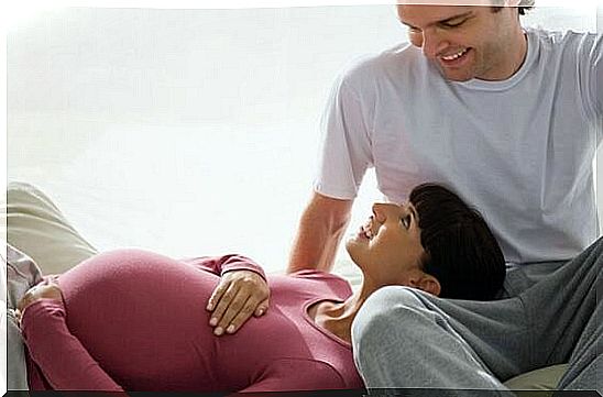 Pregnant woman with her husband.