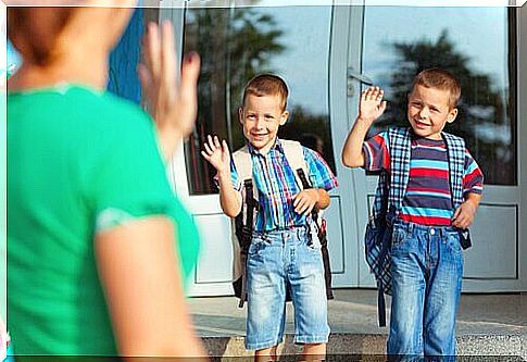 Boys waving.