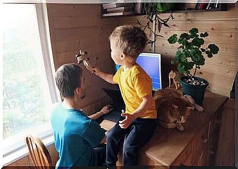 A father chooses to work from home with his son next door